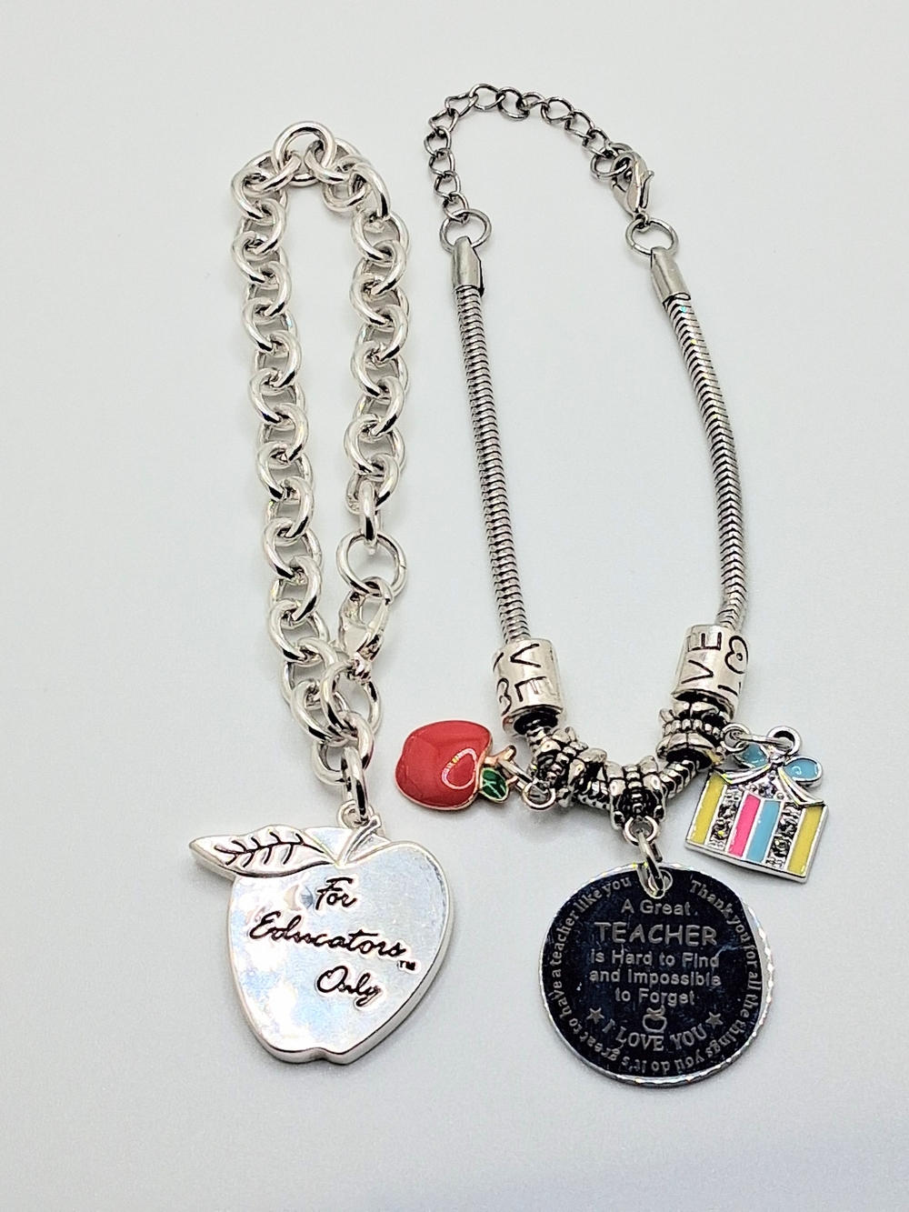 Bundle Of 2 Silvertone Teacher Dangle Bracelets